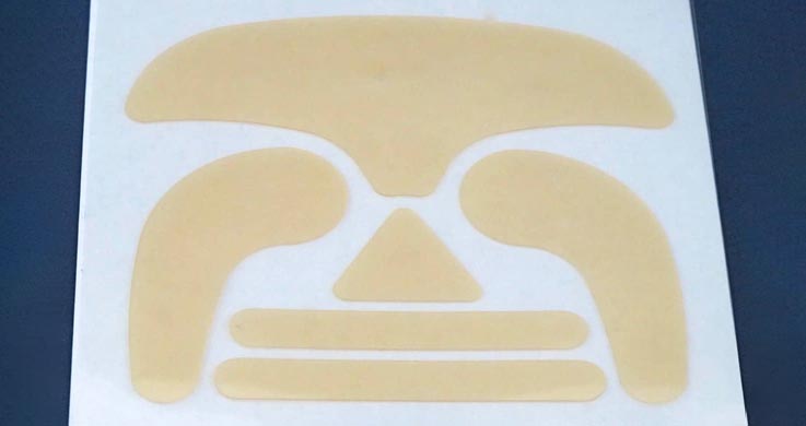 face wrinkle repair skin adhesive beauty product on white paper carrier converted by Boyd